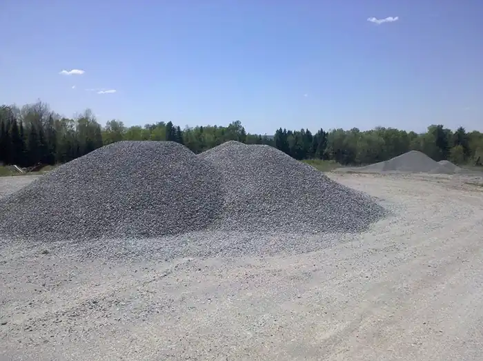 Piles of gravel and stone in the quarry yard