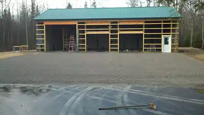Graded building pad prepared for a pole barn
